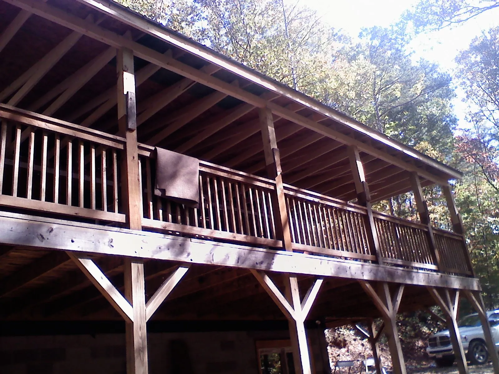 Timber framing under a new elevated porch and deck — Roof Leak Repair in Galva by Roofing Brothers